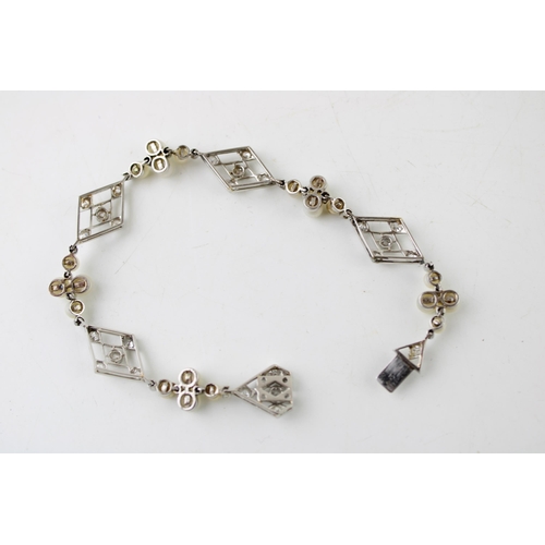 358 - An Art Deco, diamond, pearl and platinum set bracelet, of ten alternating diamond shaped panels, 14.... 