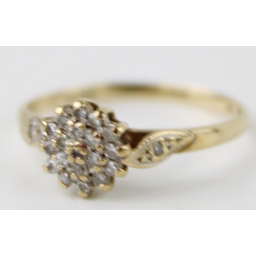 370 - 9ct gold flower head ring, set diamonds, Size N, 1.3g.