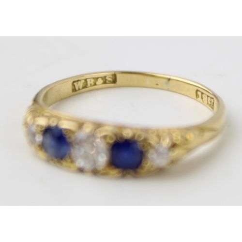 372 - 18ct diamond and sapphire five stone ring, central stone approx 0.125ct, size K, 2.3g.