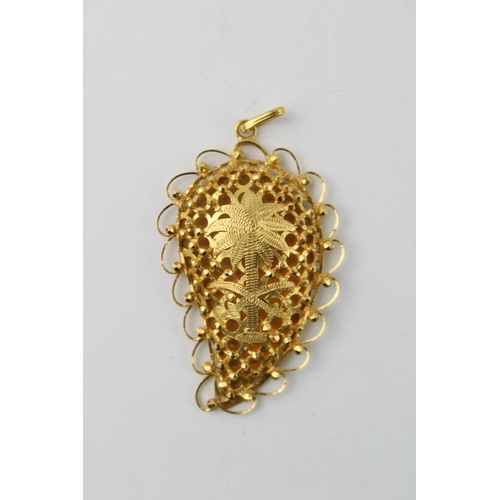 374 - Yellow metal (XRF tests as 18ct or better) ornate pendant, reticulated design of a palm tree, 15.5g,... 