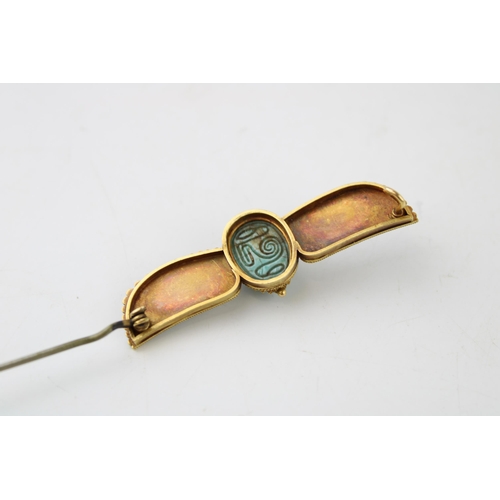 381 - 15ct gold Egyptian Revival brooch, scarab beetle, enamel decoration, steel pin, 12.5g, 64mm wide.