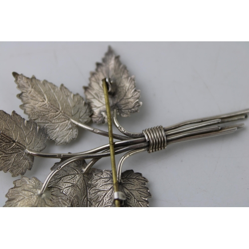 395 - Charles Horner: Hallmarked silver floral brooch, metal pin, 9.4g, 7.5cm tall.