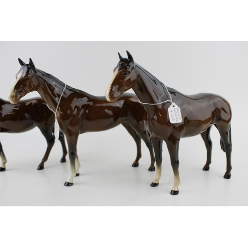 110 - Three Beswick brown horses to include a mare facing left 976, a Bois Roussel 701 and an imperial 155... 