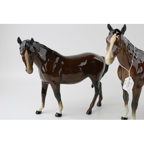 110 - Three Beswick brown horses to include a mare facing left 976, a Bois Roussel 701 and an imperial 155... 