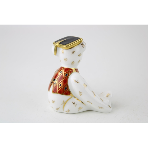 161 - Royal Crown Derby miniature bear, Graduate, 7cm high, red printed marks to the base (Please note: Th... 