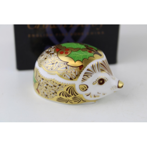 172 - Royal Crown Derby paperweight, Holly Hedgehog, gold stopper and red printed marks on the base, boxed... 