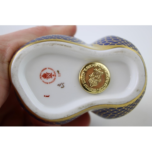 202 - Royal Crown Derby paperweight, Imari Snake, decorated in the 1128 pattern, gold stopper and red Roya... 