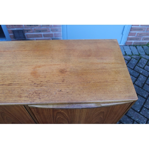 117A - A.H. Mcintosh Of Kirkcaldy retro 1960s teak sideboard raised on tapered legs. Approx 210 x 46 x 76cm... 