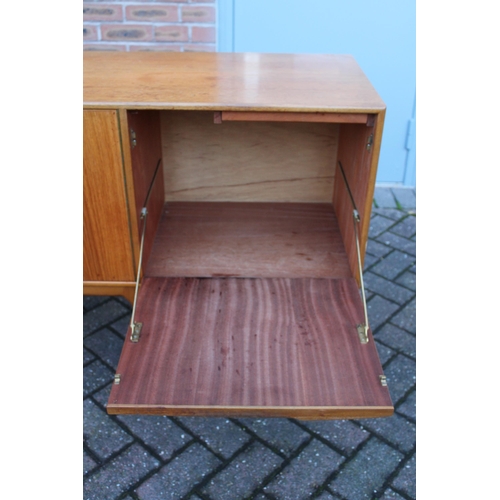 117A - A.H. Mcintosh Of Kirkcaldy retro 1960s teak sideboard raised on tapered legs. Approx 210 x 46 x 76cm... 