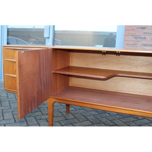 117A - A.H. Mcintosh Of Kirkcaldy retro 1960s teak sideboard raised on tapered legs. Approx 210 x 46 x 76cm... 