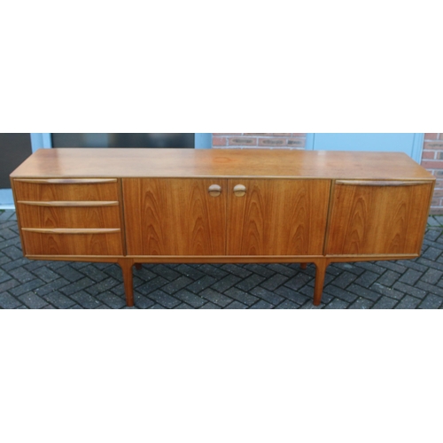 117A - A.H. Mcintosh Of Kirkcaldy retro 1960s teak sideboard raised on tapered legs. Approx 210 x 46 x 76cm... 