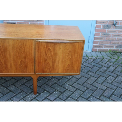 117A - A.H. Mcintosh Of Kirkcaldy retro 1960s teak sideboard raised on tapered legs. Approx 210 x 46 x 76cm... 