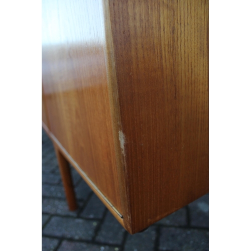 117A - A.H. Mcintosh Of Kirkcaldy retro 1960s teak sideboard raised on tapered legs. Approx 210 x 46 x 76cm... 