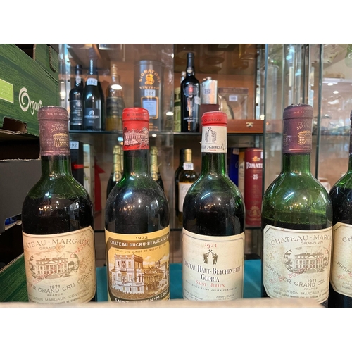 190 - A collection of vintage French wines in a wooden case to include five bottles of Chateau Margaux 197... 