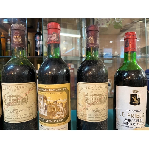 190 - A collection of vintage French wines in a wooden case to include five bottles of Chateau Margaux 197... 