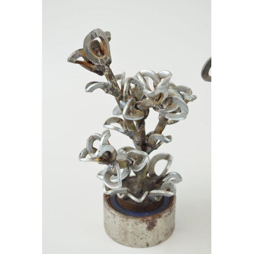 337A - A pair of contemporary metal fabricated floral exhibits, made from washers, bolts and spare metal co... 