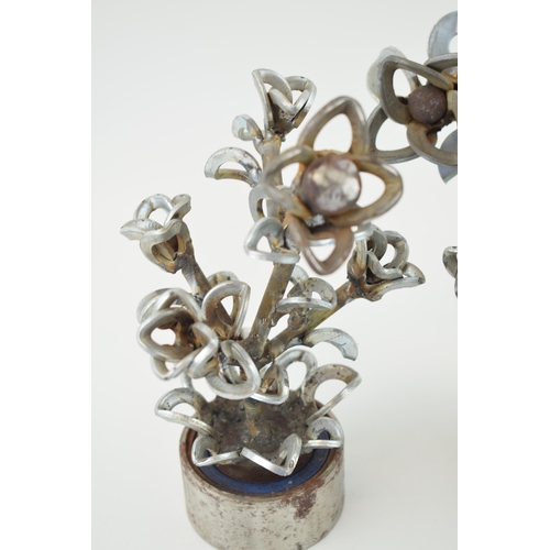 337A - A pair of contemporary metal fabricated floral exhibits, made from washers, bolts and spare metal co... 