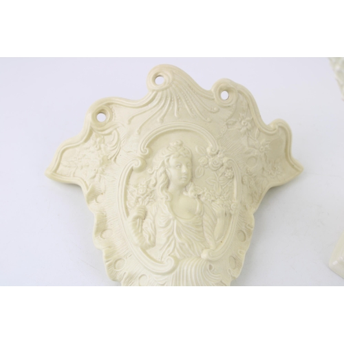 12 - Wedgwood Cornucopia 'Williamsburg Restoration' posy holder together with another wall mounted exampl... 