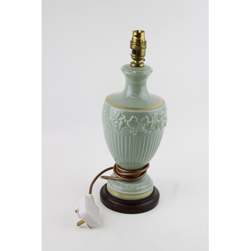 13 - Wedgwood Queensware lamp base in green with gilt banding. Possible trial piece. Height 38cm.