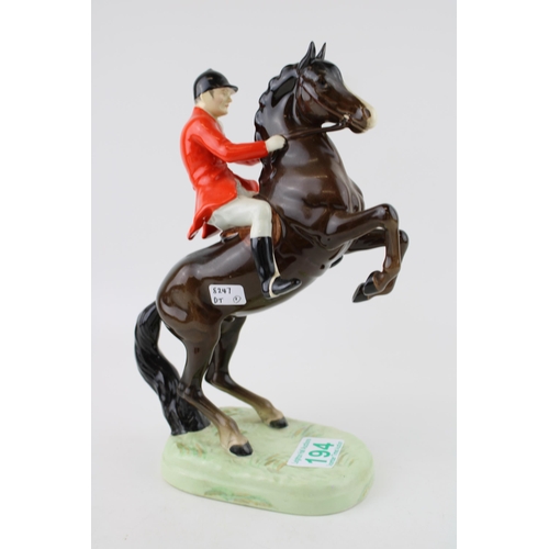 194 - A Beswick rearing Huntsman model number 868. Height 23cm.