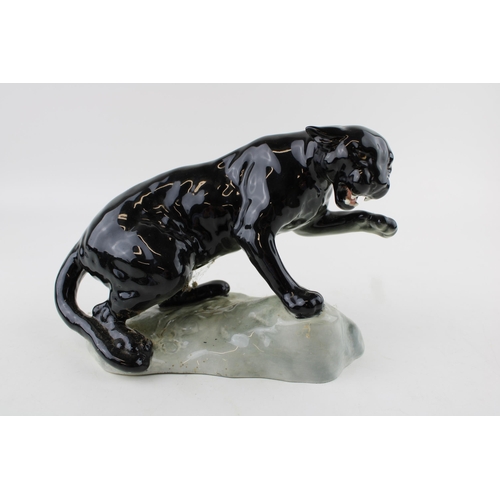 213 - Beswick black puma on rock, 1823.