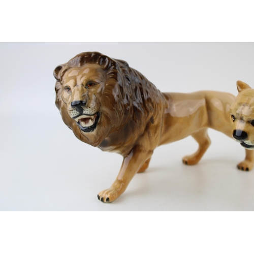 215 - Two Beswick Lions (2).