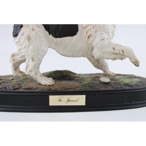 216 - Beswick The Spaniel, on ceramic base (Doulton backstamp).