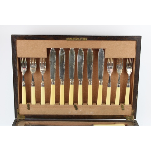 253 - A quality Thomas Turner of Sheffield cutlery set in oak case.