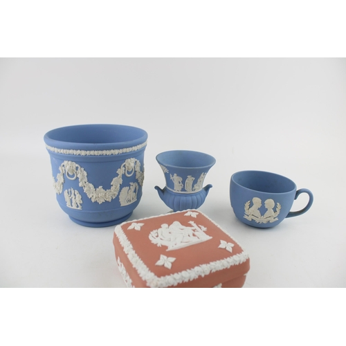 27 - A collection of Wedgwood Jasperware items to include a large Terracotta lidded pot together with a W... 