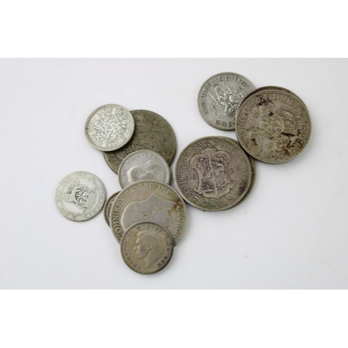 341 - A collection of UK silver coinage to include 83.2g of 1/2 silver coins together with 30.9g of full s... 