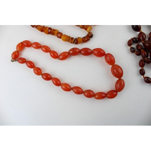 364 - A collection of amber or similar beads to include butter scotch coloured amber and baltic type amber... 