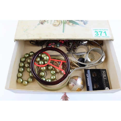 371 - A vintage jewellery box with contents to include bangles, beads, ladies cocktail watches, silver rin... 