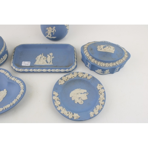 8 - A collection of Wedgwood Jasperware items to include pin trays, bud vase and lidded pots. (Qty)