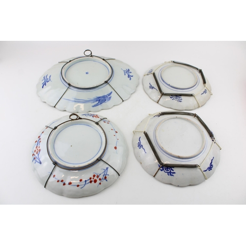 101 - A collection of 19th century Imari pattern wall chargers / plates. (4)