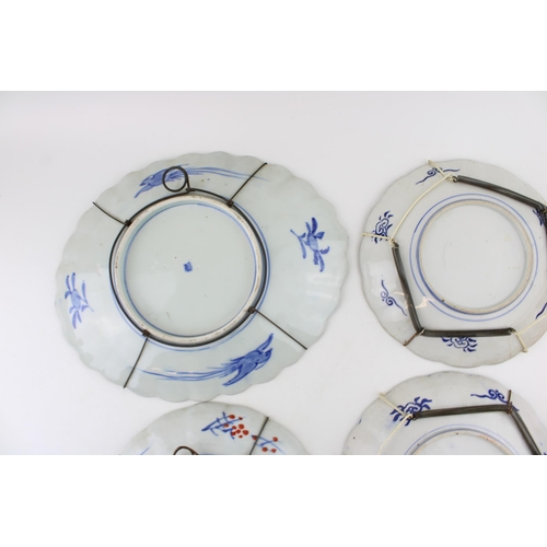 101 - A collection of 19th century Imari pattern wall chargers / plates. (4)