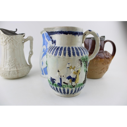 104 - A collection of 19th century pottery jugs to include salt glazed relief pitchers by Doulton, Prattwa... 