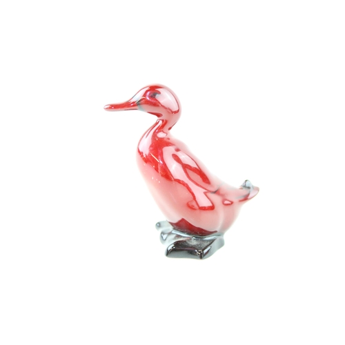 146 - Royal Doulton flambe duck, 6.5cm tall.