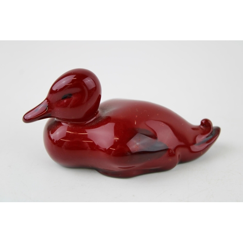 147 - Royal Doulton flambe swimming duck, 9cm long.