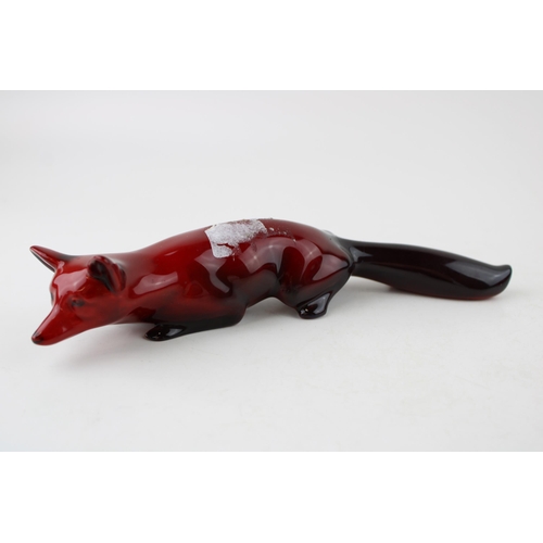 151 - Large Royal Doulton flambe stalking fox, 22.5cm long (tail af).