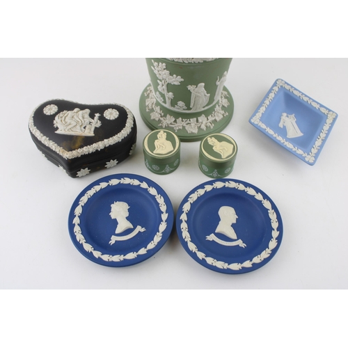 2 - A collection of Wedgwood Jasperware items to include a sage green display vase, a large, black heart... 