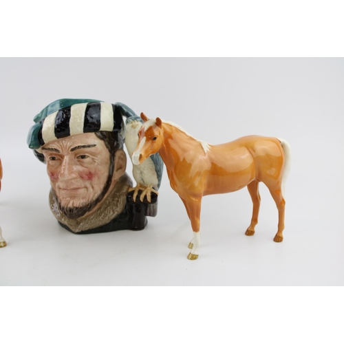 246 - Two Beswick palomino horses (1 ear af) and a large Royal Doulton character jug The Falconer (3).