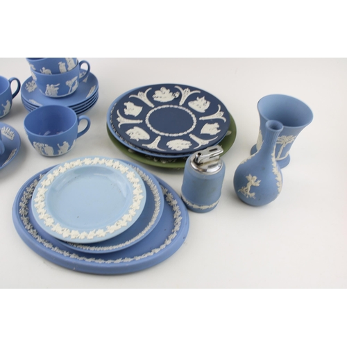 25 - A collection of Wedgwood Jasperware and Queensware to include vases, plates, tea cups and saucers, a... 