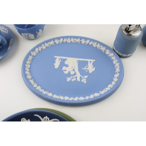 25 - A collection of Wedgwood Jasperware and Queensware to include vases, plates, tea cups and saucers, a... 