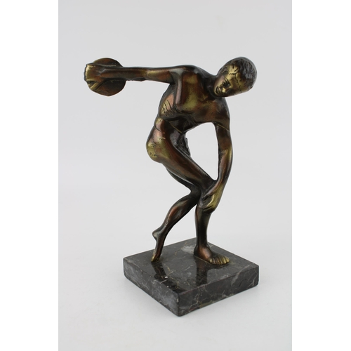 256 - A spelter figure of Discus on marble on base. Height 18cm.