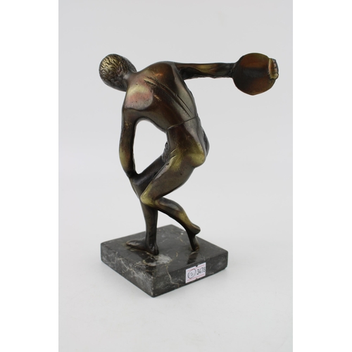 256 - A spelter figure of Discus on marble on base. Height 18cm.