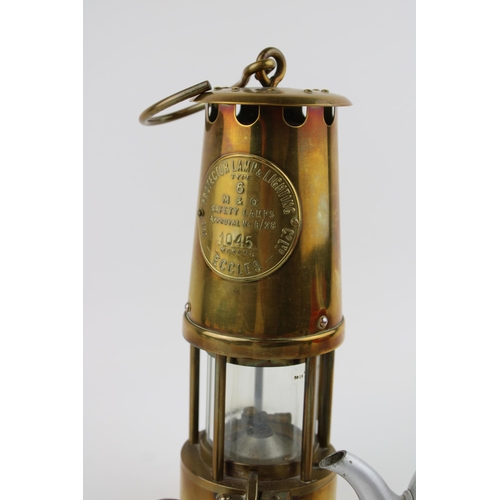 260A - An Eccles Protector lamp Type 6 M & O Safety Lamp. Miners safety lamp, height 25cm together with a S... 