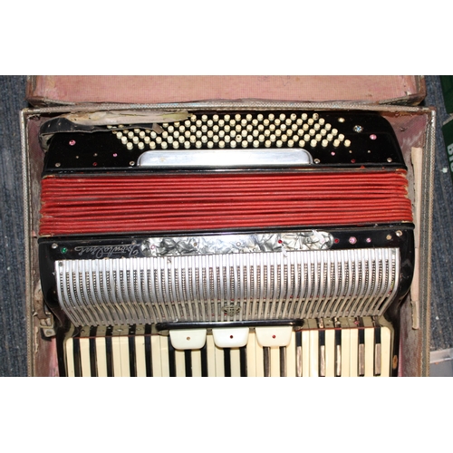 277 - A vintage accordion in original case. Width 57cm height 26cm.