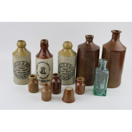 278 - A collection of two-tone stoneware flagons and jars to include John Henry Lees ginger ale, Dales & S... 