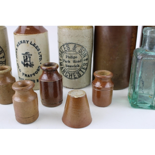 278 - A collection of two-tone stoneware flagons and jars to include John Henry Lees ginger ale, Dales & S... 