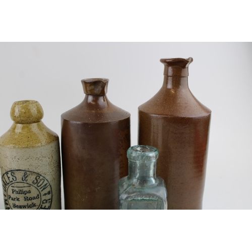 278 - A collection of two-tone stoneware flagons and jars to include John Henry Lees ginger ale, Dales & S... 